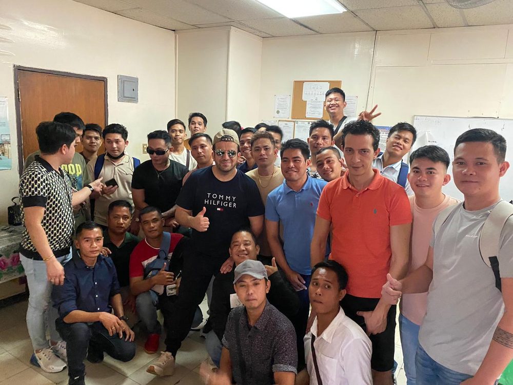 Around The World recruitment team meeting with a batch of skilled worker applicants at the Manila office